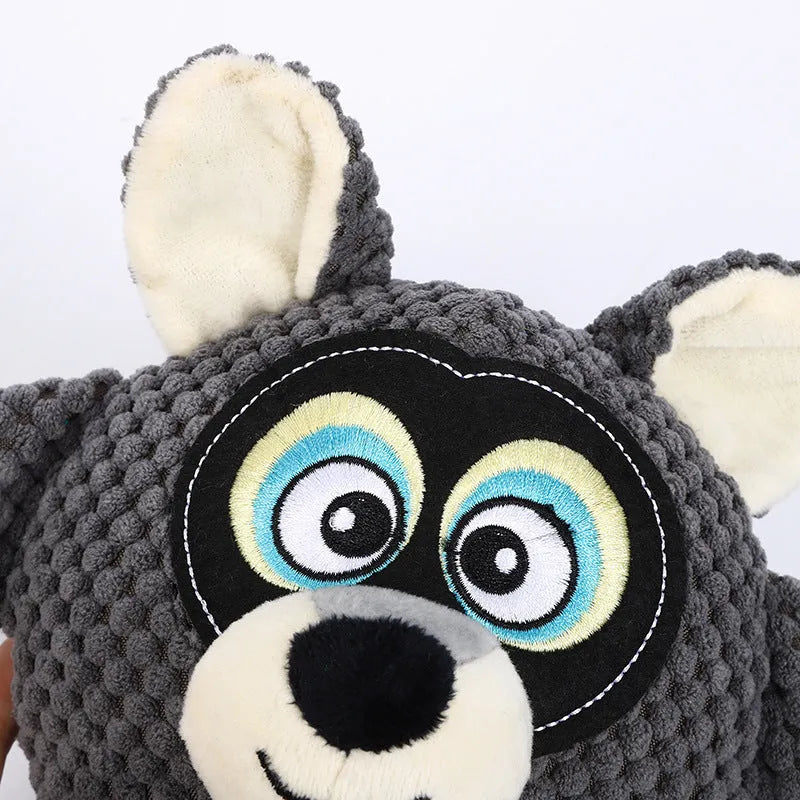 Bite resistant dog plush toy for tooth cleaning measuring 27x24cm in blue, gray, orange