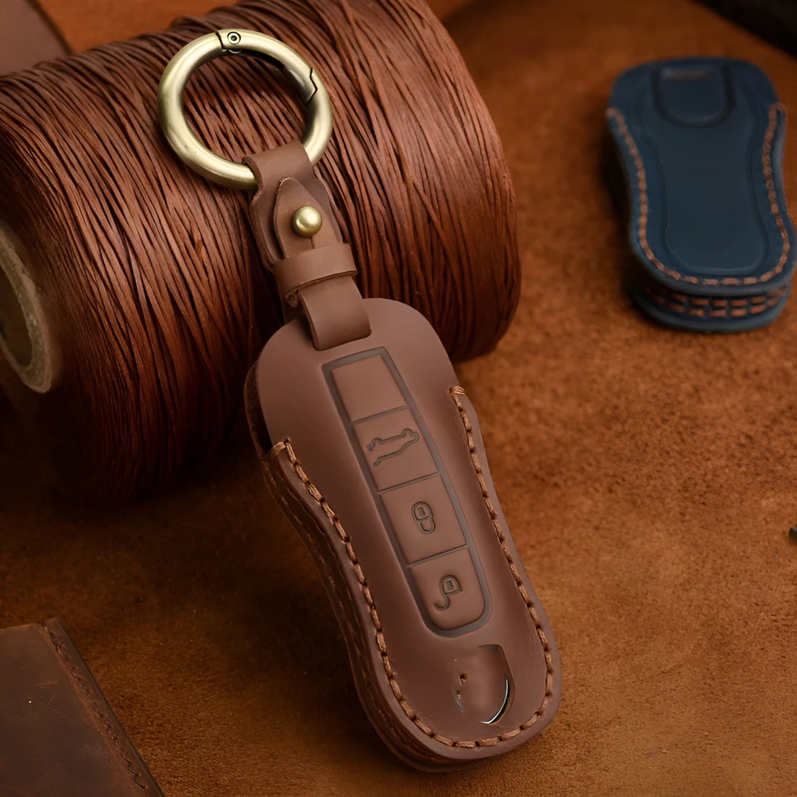 Authentic leather Porsche key cover with retro bag buckle in blue colour