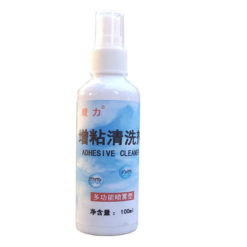 Table tennis racket cleaner kit with sponge mop, rubber cleaning agent bottle and protective film on table