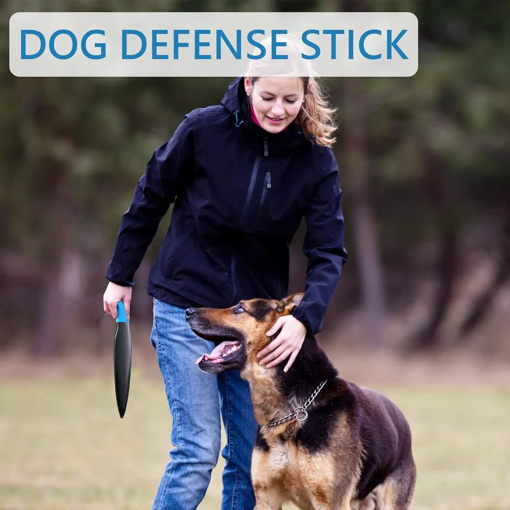 Blue handled nylon dog break stick measuring 35cm on a grass background.