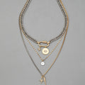 Multi-layer twin necklace for women with alloy electroplated ellipse pendant in clavicle chain style