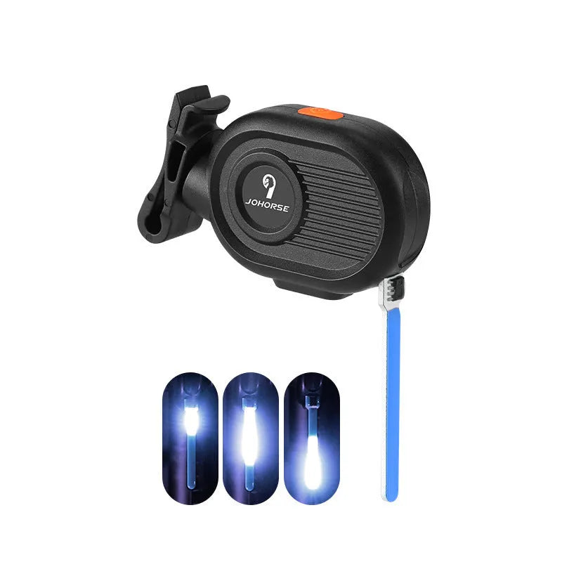 Blue bicycle taillight showing a running water drops light pattern, mounted on a bike seat post.