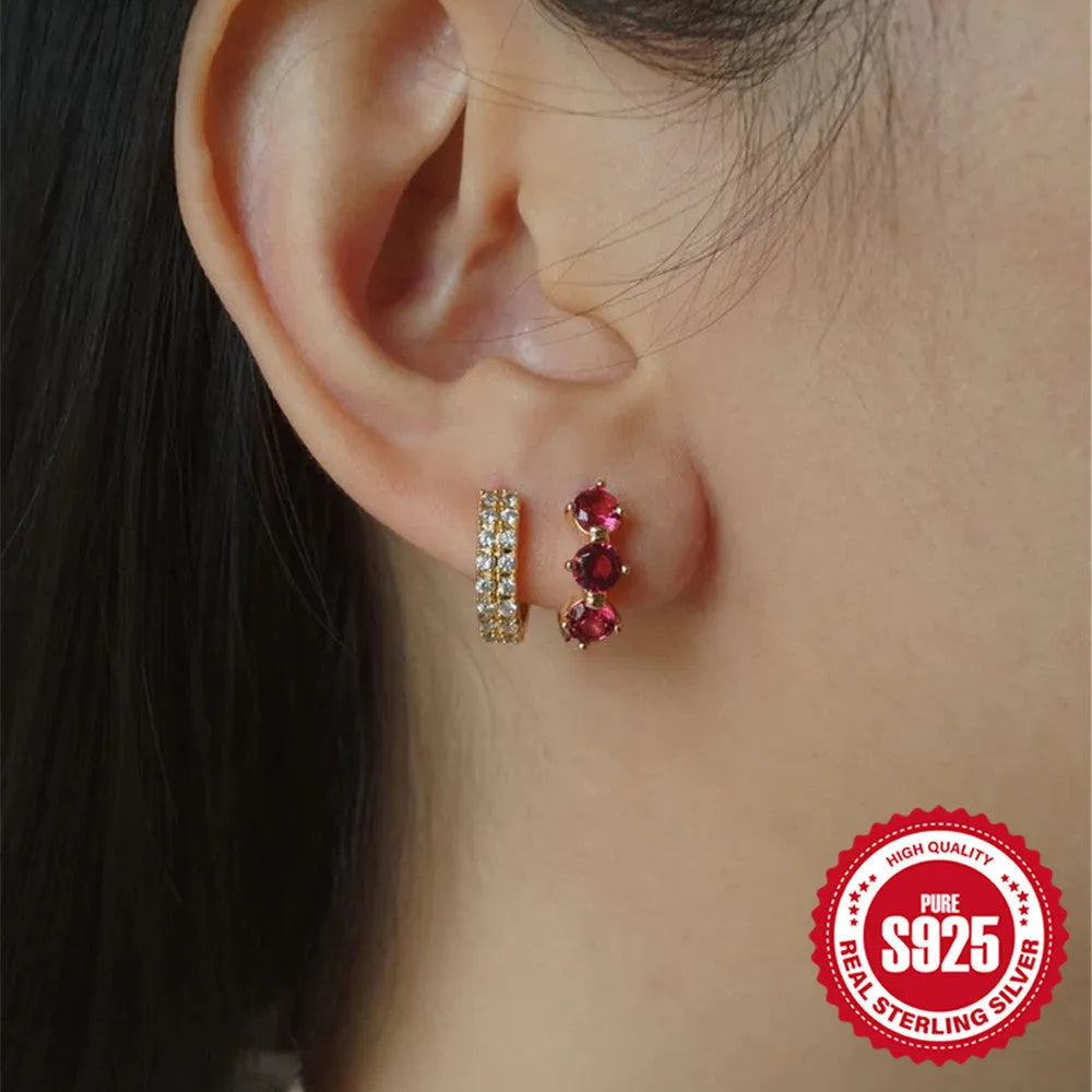 A pair of geometric sunflower design earrings in sterling silver with golden zircon stones, showcasing Mori fairy style.