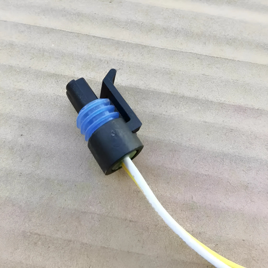 ACDelco engine coolant temperature sensor plug for automotive side light replacement.