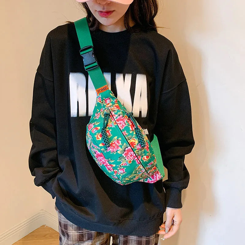 Women's western style waist bag with big flower design and contrast stitching in nylon material