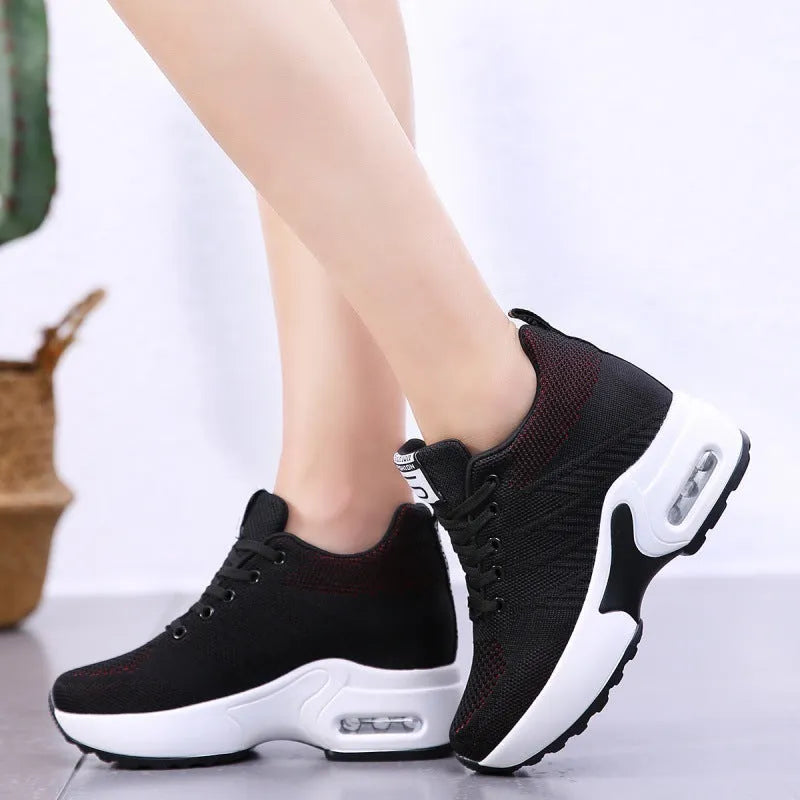 Women's lightweight casual travel shoes in white with fabric upper and round toe