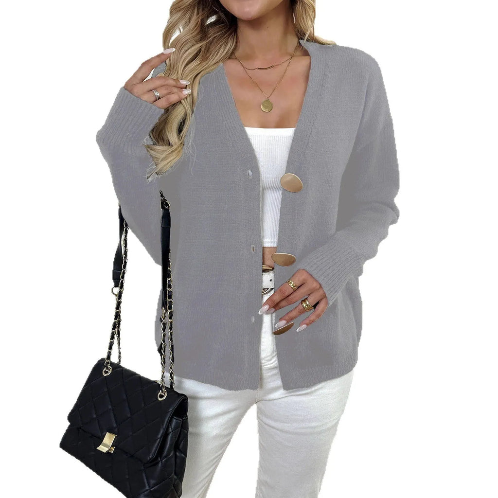 A grey deer plush women's long sleeve sweater coat with princess sleeves, shown in a street hipster style.