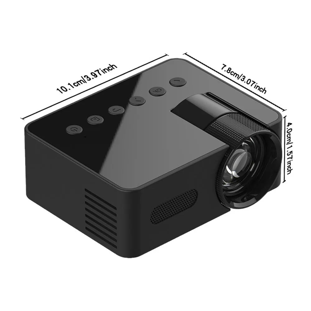 YT100 black mini portable projector on a desk with remote control and USB cable