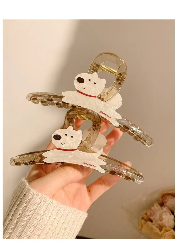 Cartoon puppy hair barrettes in beige and brown colours showing Korean style designs