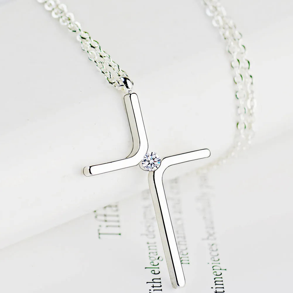 Titanium steel cross pendant necklace with inlaid gold finish and water wave chain, silver colour option