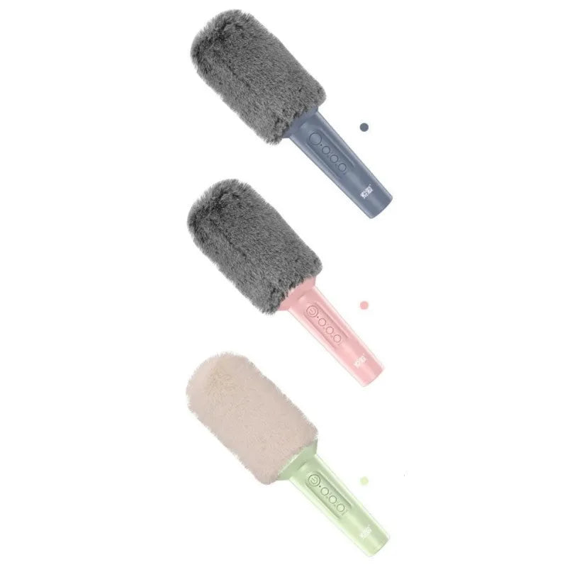 Wireless Bluetooth karaoke microphone in pink, blue, or green with integrated speaker.