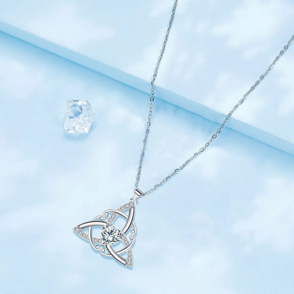 Geometric Celtic knot necklace pendant in copper with electroplated finish showing colour options