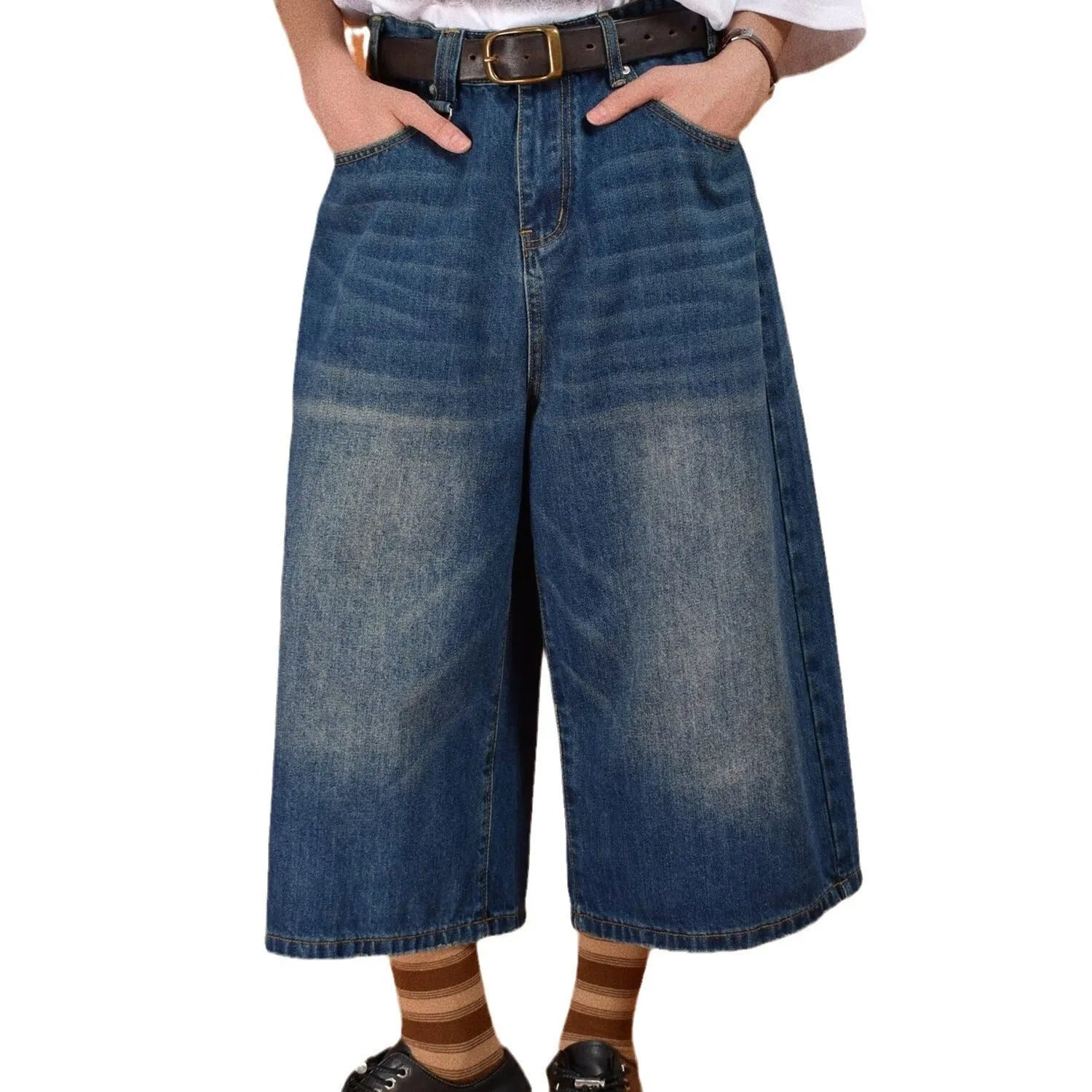 Men's straight loose fit blue denim shorts on a plain background