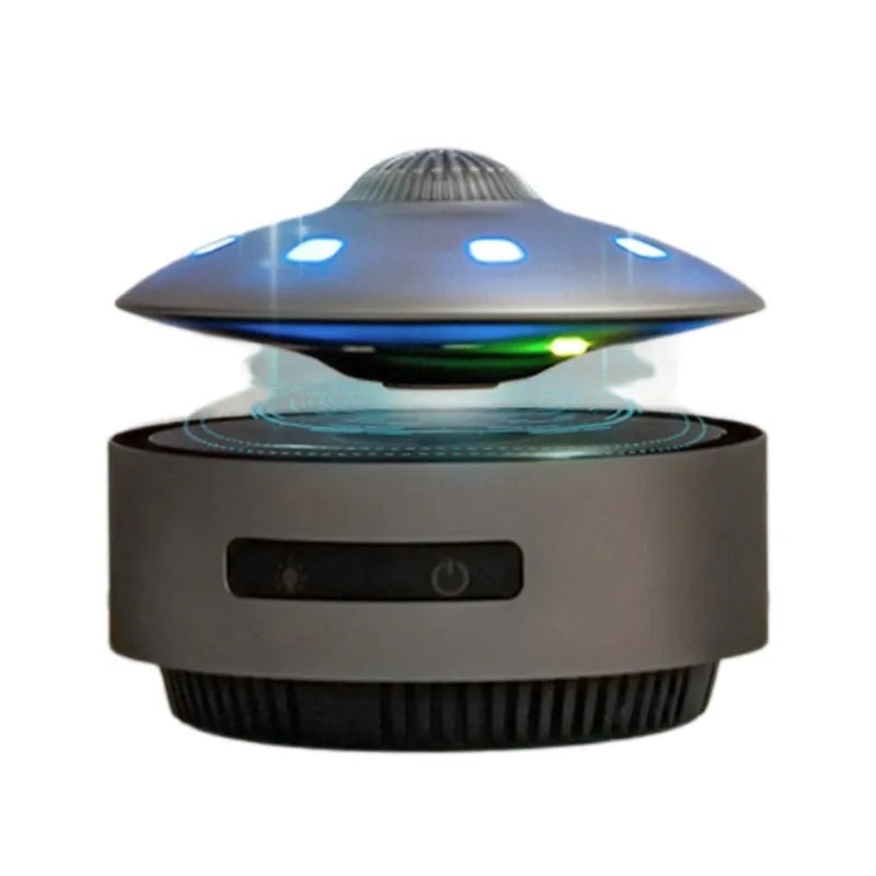 Automatic lifting magnetic levitation Bluetooth speaker hovering above its base.