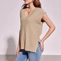 Women's V-neck sleeveless loose pullover vest in viscose fabric, shown in striped or plaid pattern