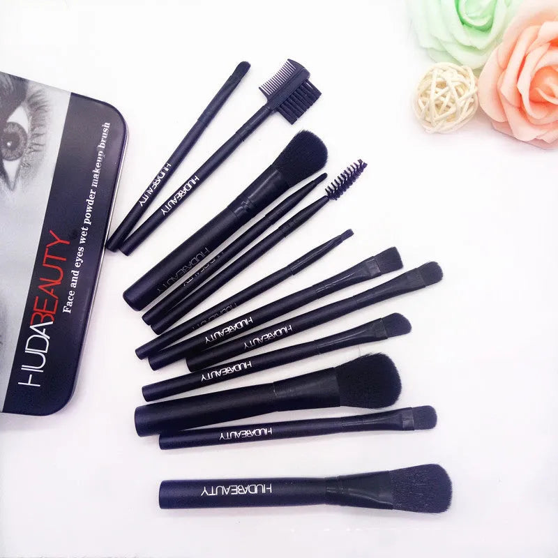 12-piece black makeup brush set in metal tin box with wooden handles and corrugated silk nylon bristles