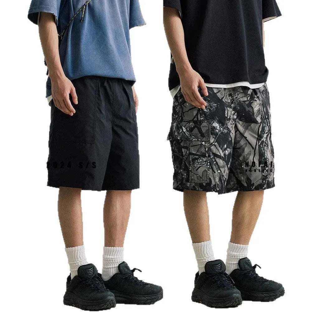 Men's loose straight-leg denim shorts with elastic waist in black or army green colour
