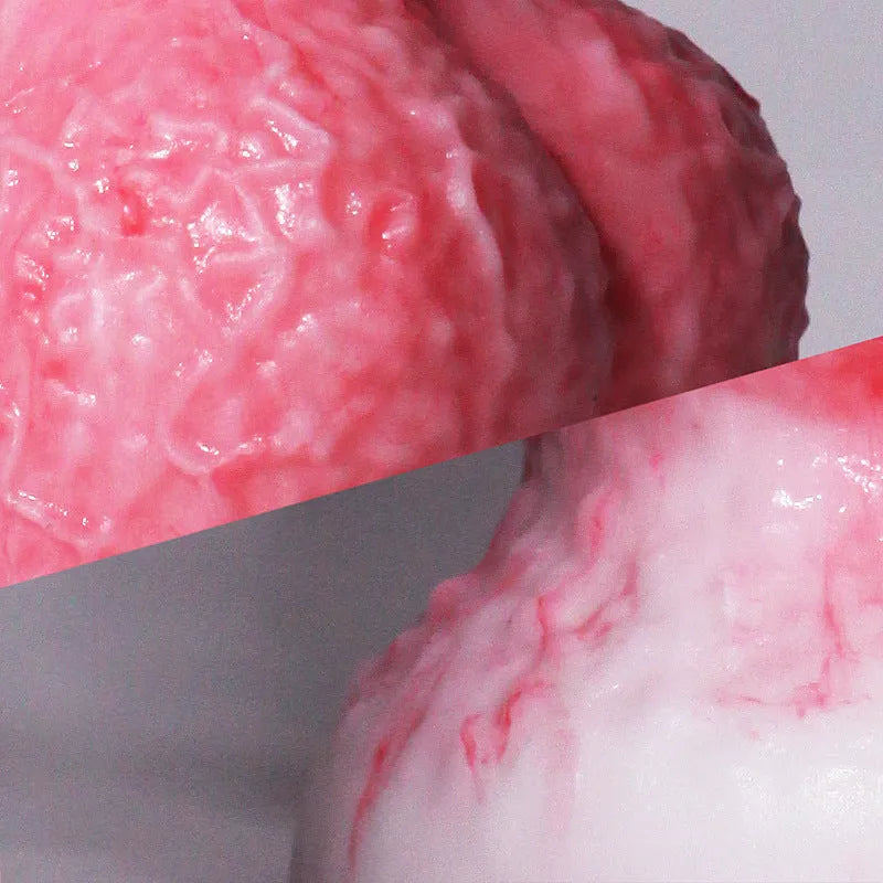 Pink platinum silicone penis-shaped masturbation device for women, showing Berserker S and M size options
