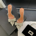 Silver pointed toe bow rhinestone transparent high heel sandals with slip-on design