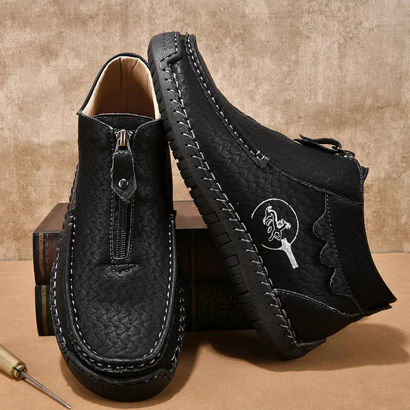 Men's brown slip-on leather loafers with round toe and rubber sole shown from side view