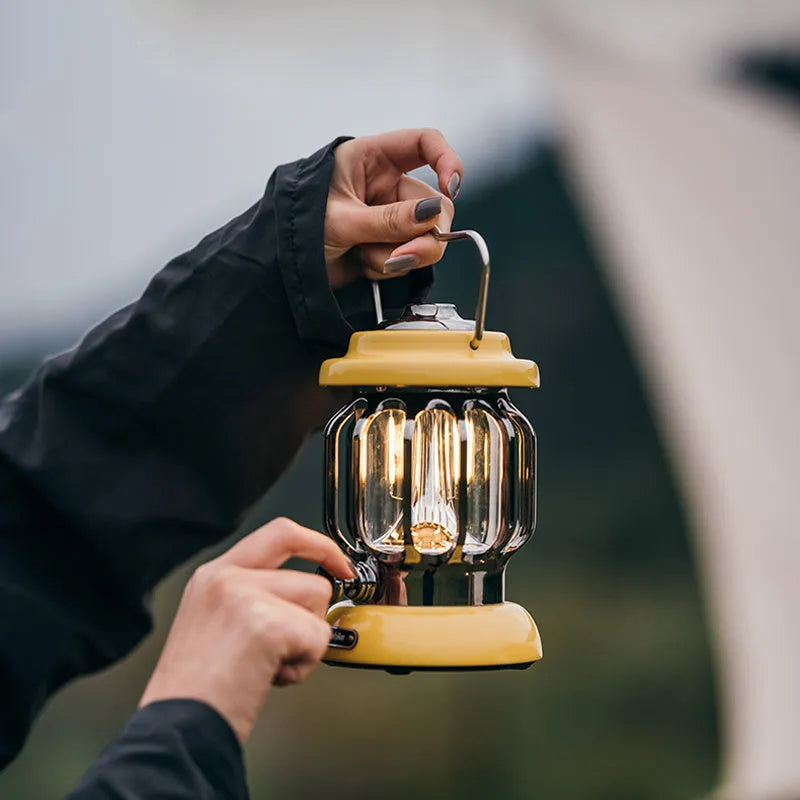 Sundial Yellow portable camping lantern with iron body, 17cm height, and dual LED lighting