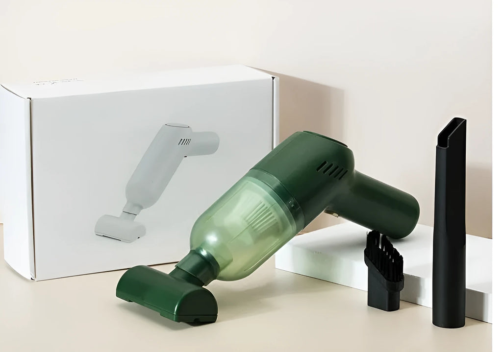 Electric cat and dog hair suction cleaner in green, USB powered, 244x72x157mm, with two suction heads on a fabric surface.