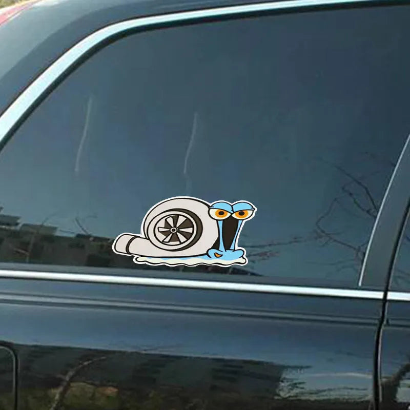 Reflective car bumper sticker with colourful cartoon snail design measuring 12cm by 8cm