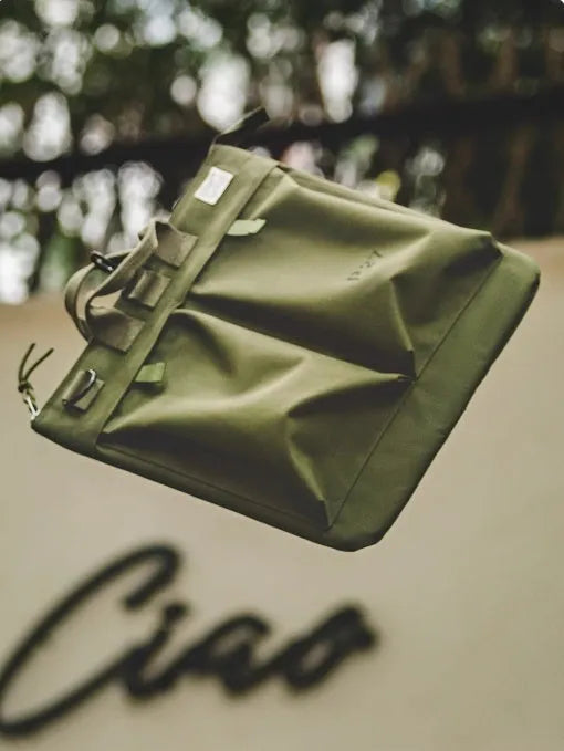 Marden Tooling medium-sized charcoal black canvas crossbody messenger bag with shoulder strap.
