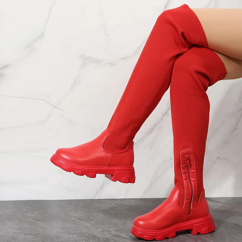Women's knee high boots in black or red with side zipper, 3-5 cm square mid heel, artificial PU upper, and rubber sole.