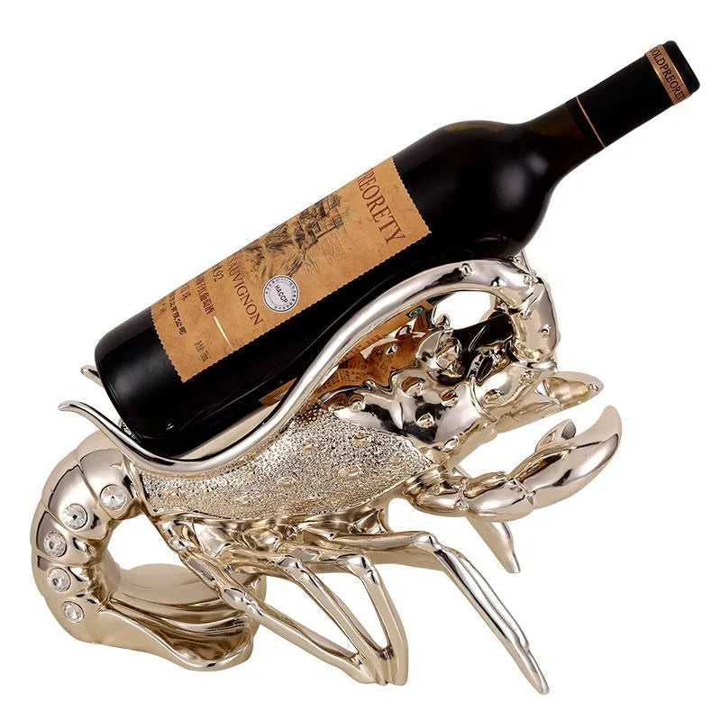 Lobster-shaped wine rack ornament in rose gold or silver holding a wine bottle