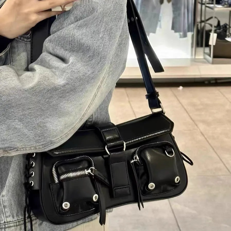 Black women's PU leather baguette messenger bag with a long shoulder strap
