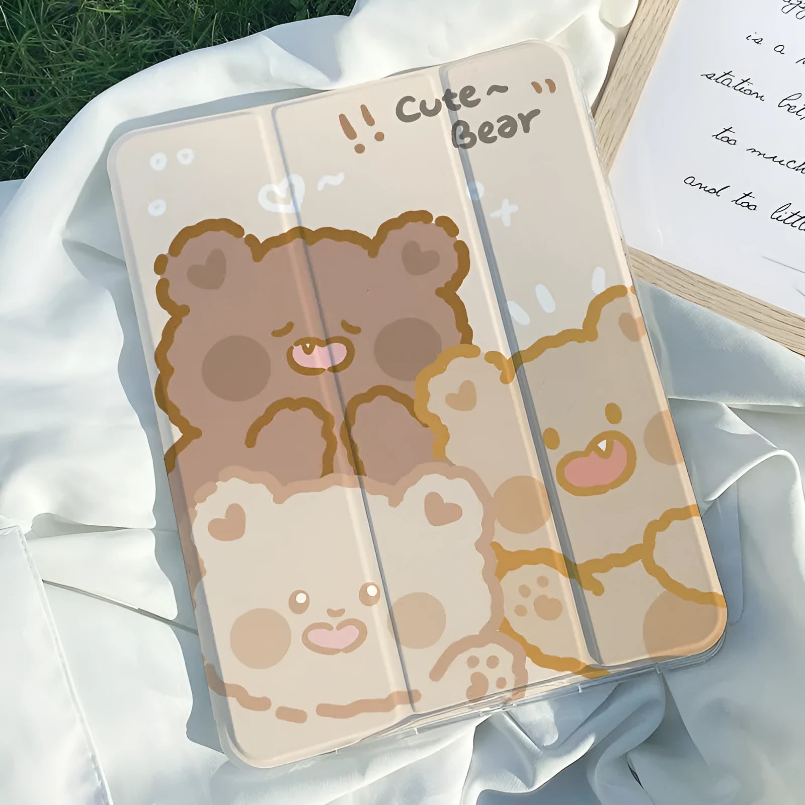 Silicone tri-fold protective case for iPad in cartoon rabbit design, shown in stand mode.