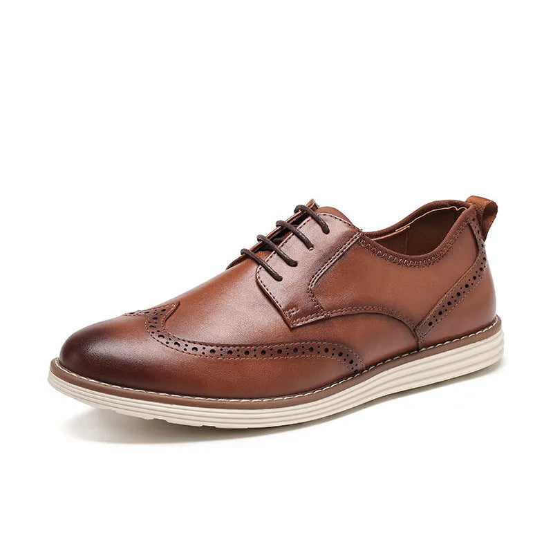 Men's black and brown slip-on business casual shoes with round toe and carved pattern detail