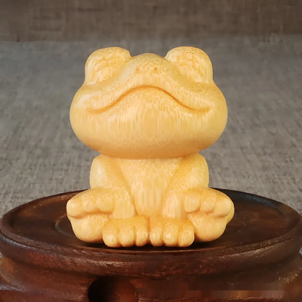 Solid bamboo carving ornament with smiling frog design measuring 5cm height