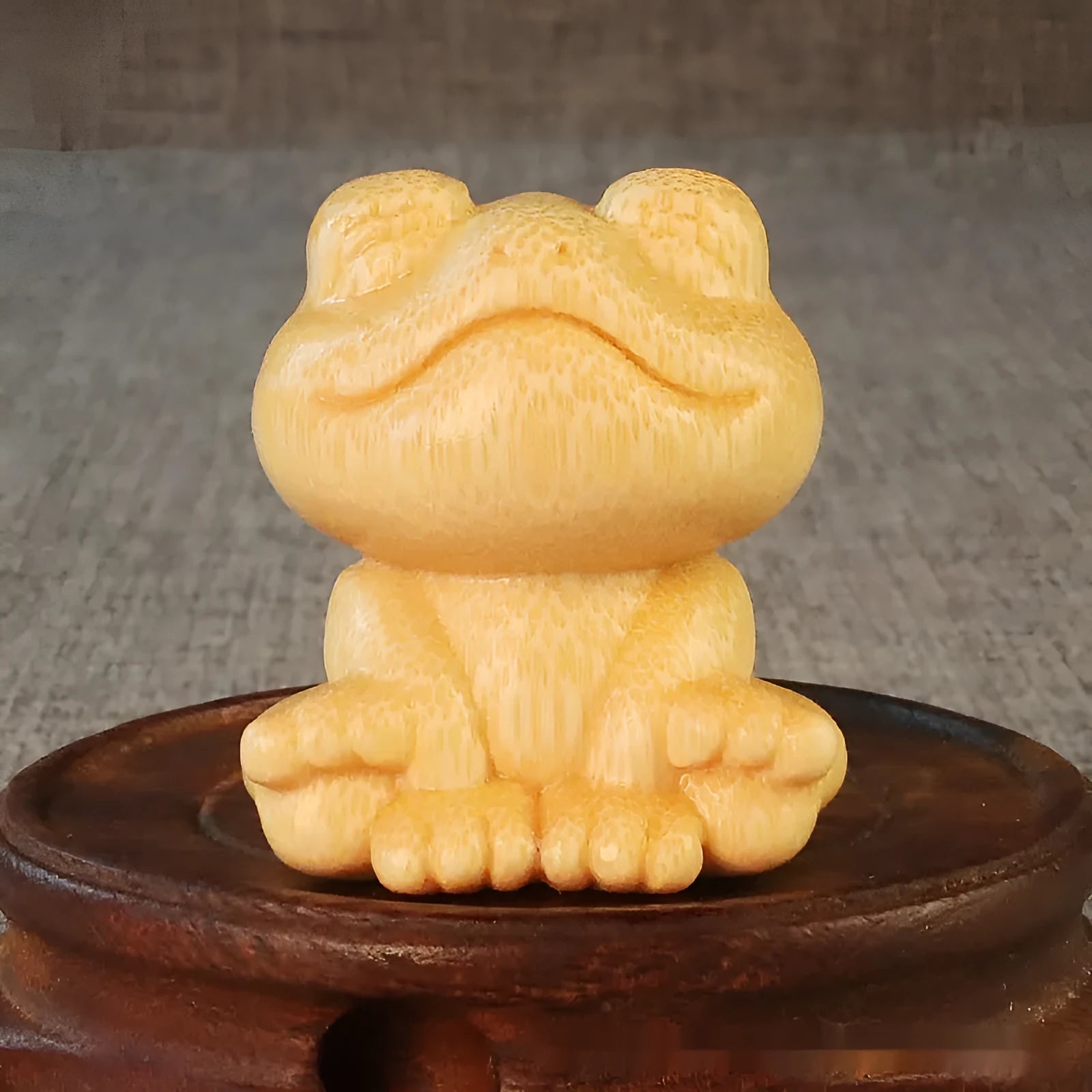 Solid bamboo carving ornament with smiling frog design measuring 5cm height