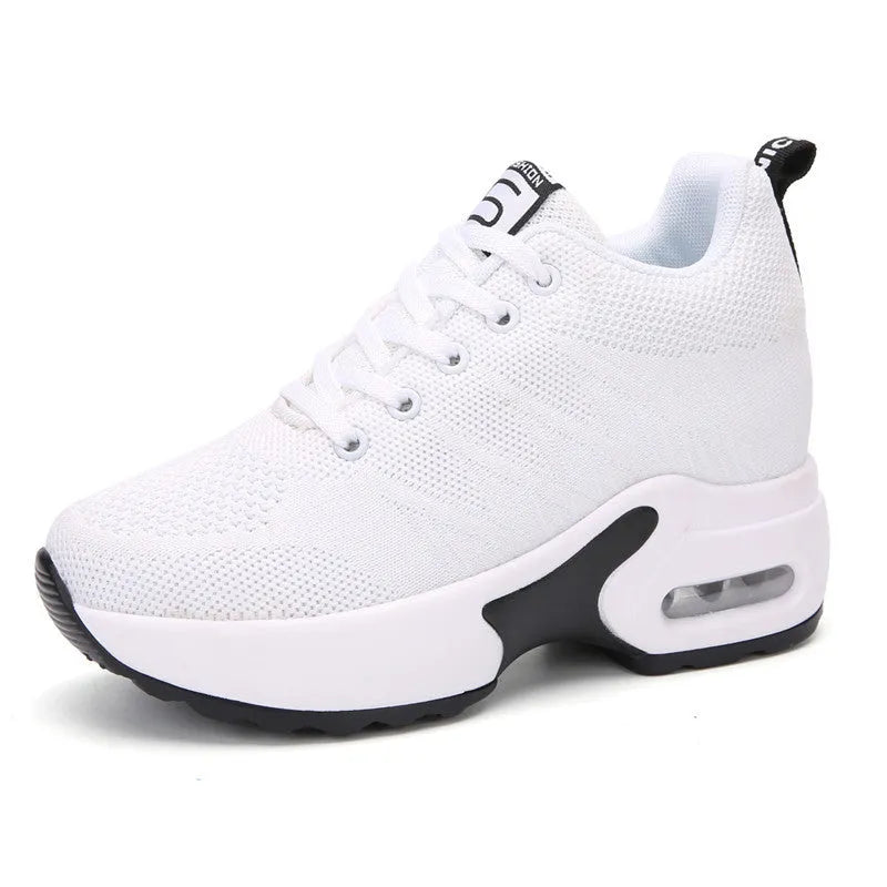 Women's lightweight casual travel shoes in white with fabric upper and round toe