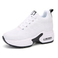 Women's lightweight casual travel shoes in white with fabric upper and round toe