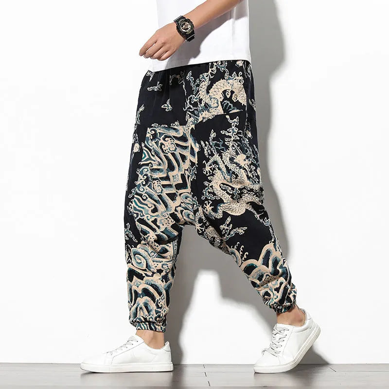 Cotton wide-leg beach trousers with elephant flower print in blue fan colour, nine-point length, mid-waist