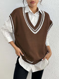 Women's college style acrylic blend sweater vest in loose pullover design