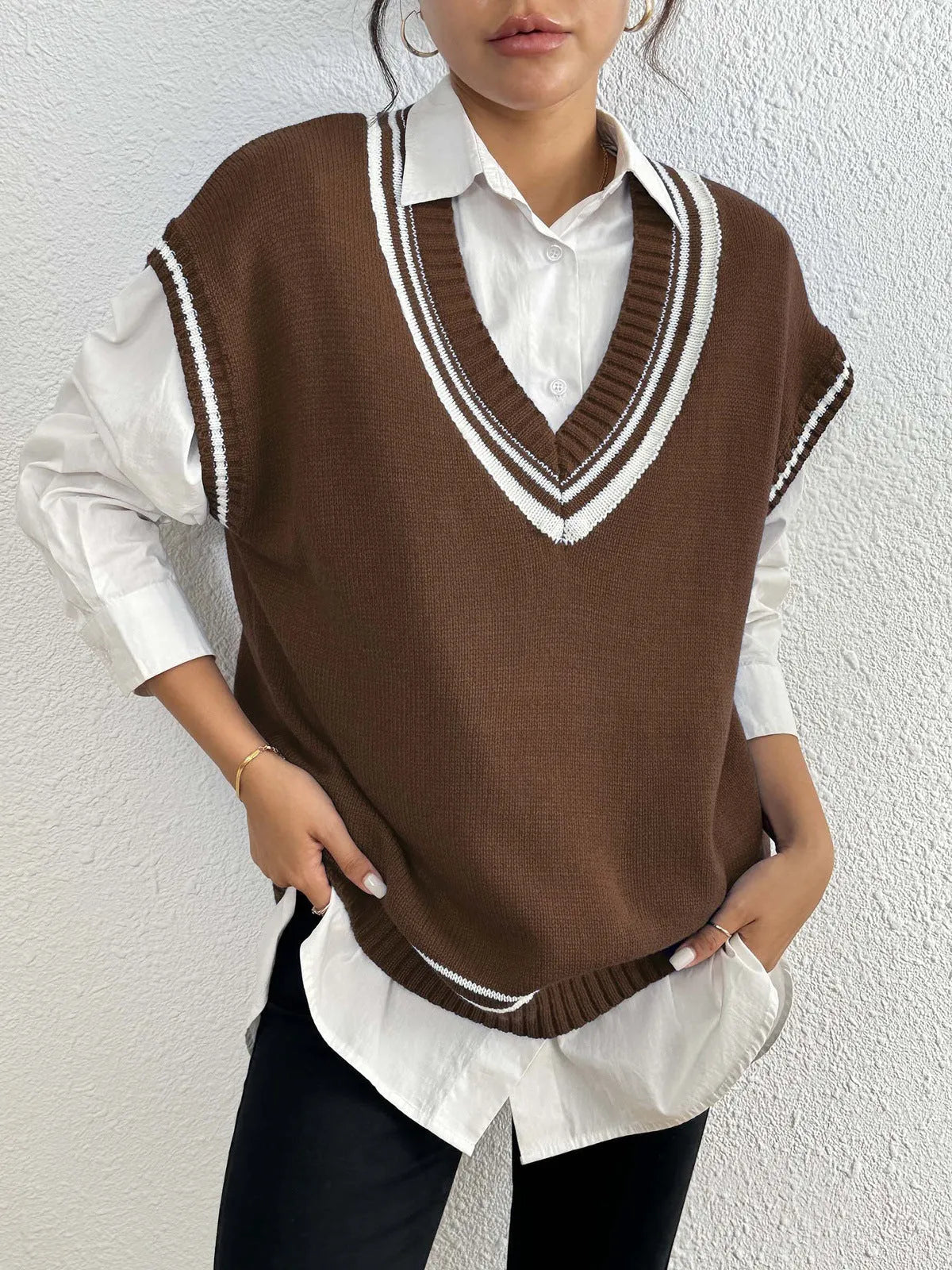 Women's college style acrylic blend sweater vest in loose pullover design