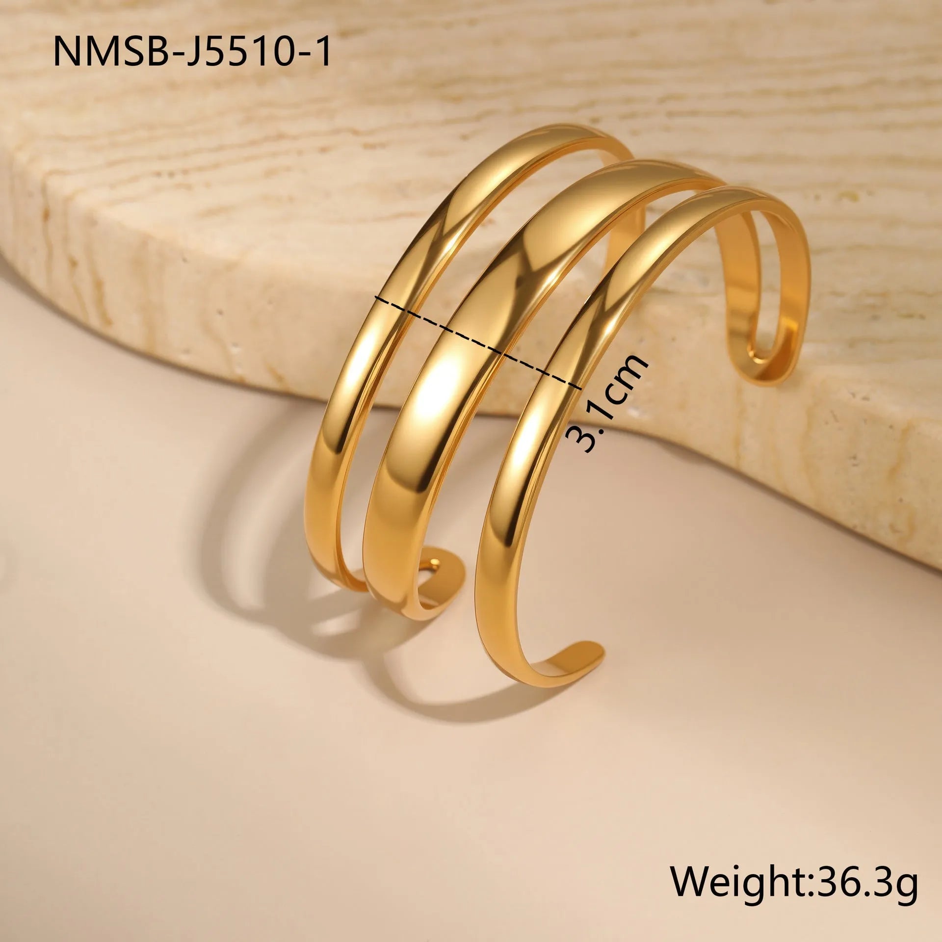 Women's stainless steel simple opening bracelet with geometric line design in gold or steel colour.