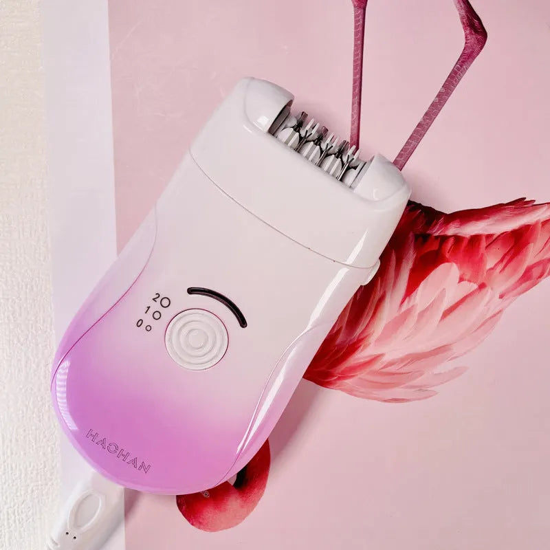 Pink three-in-one USB hair removal device with shaver head, grinding head, and skin rub accessories