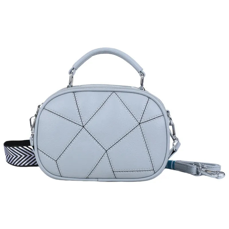 Round women's PU leather patchwork small bag with three-layer design and stitching detail