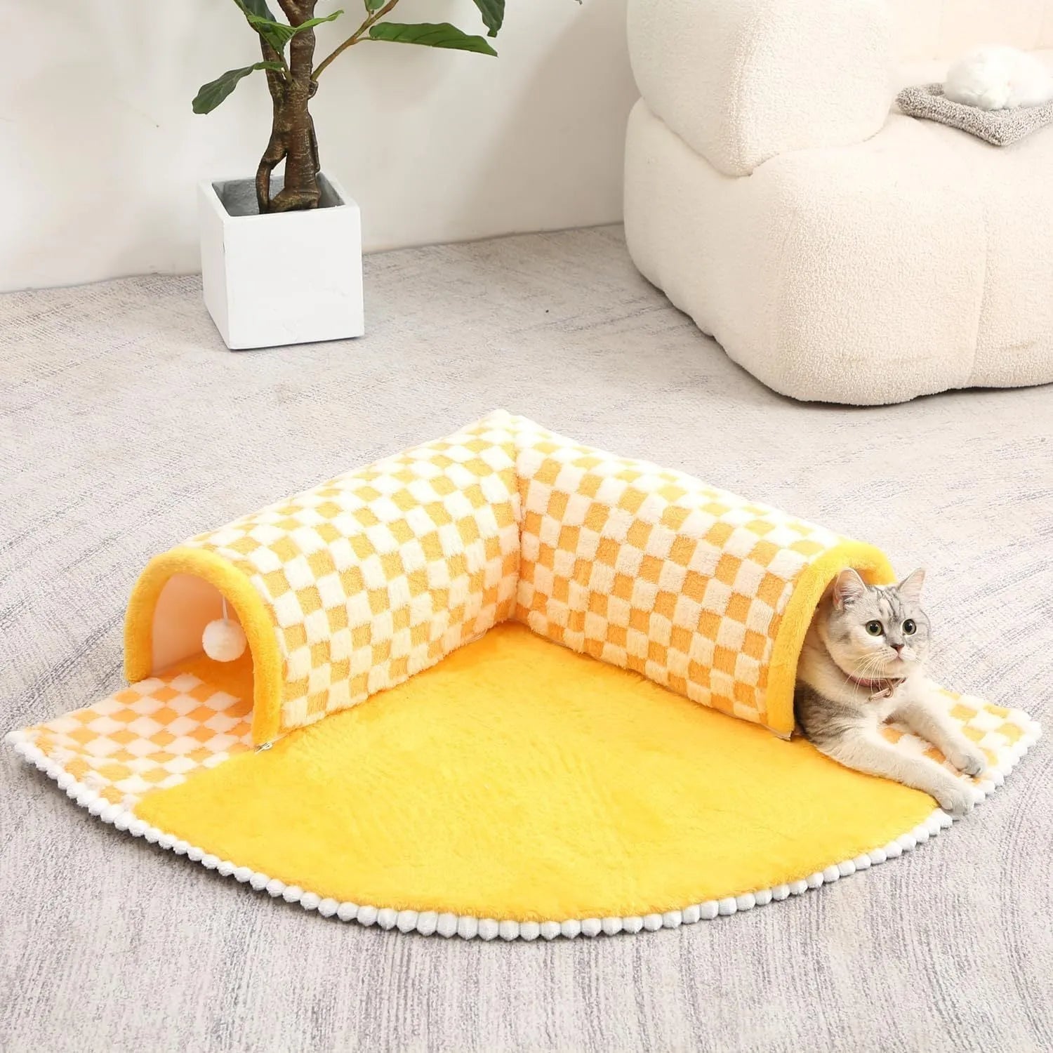 Coffee coloured plush dog and cat bed with integrated tunnel, shown in a fan-shaped plaid design