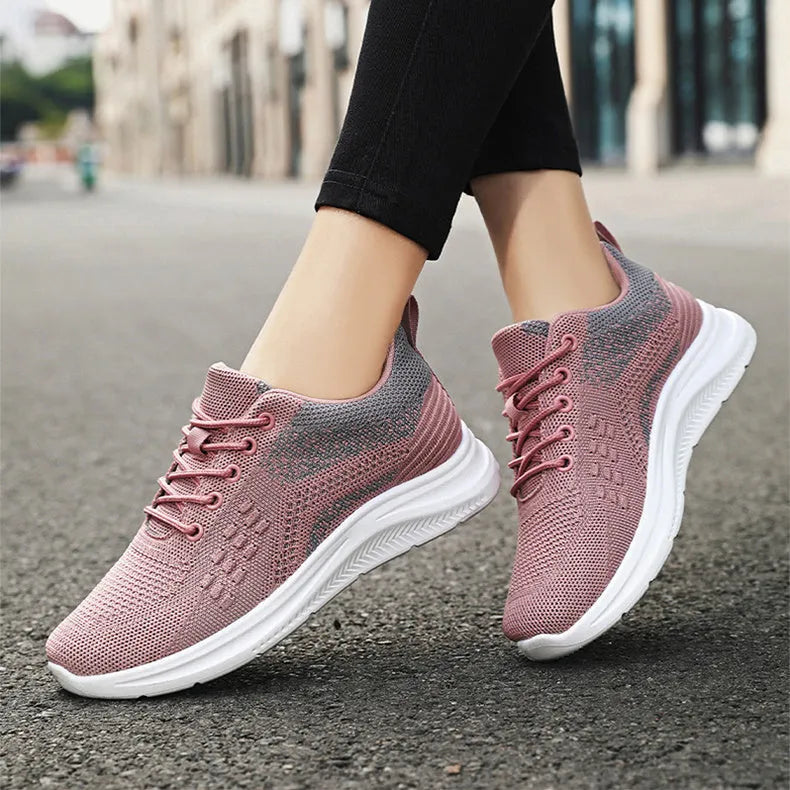 Women's lace-up sneakers in breathable mesh cloth, solid colour, round toe, PVC sole
