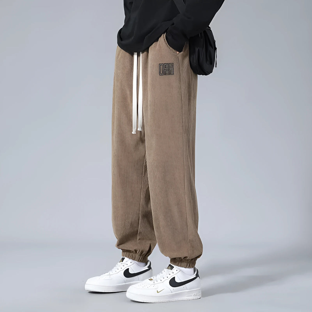 Men's workwear casual sports trousers in polyester fibre with letter print, available in black, dark gray, and khaki