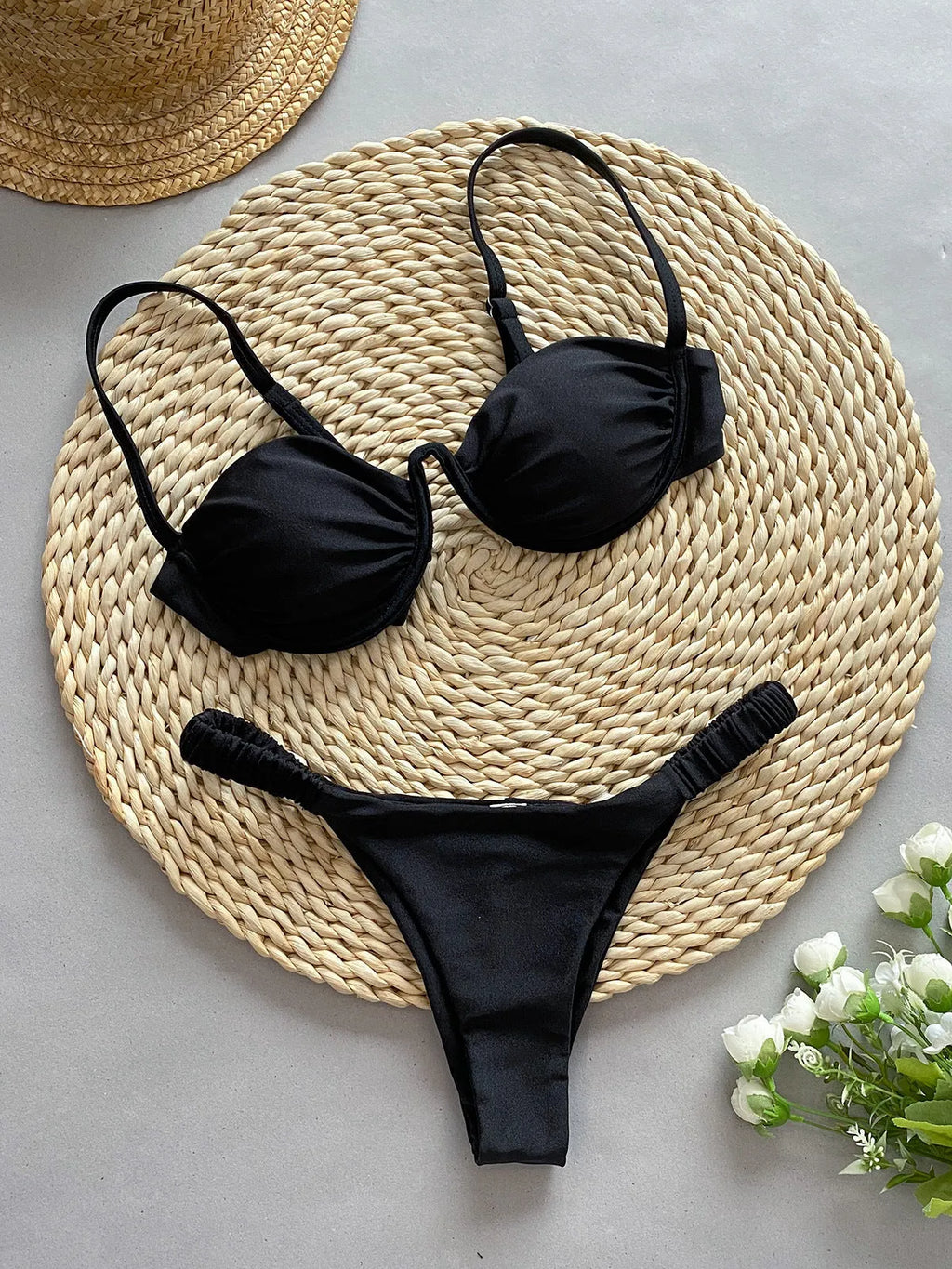 Women's underwire bikini swimsuit in black with split bottom design and European fit