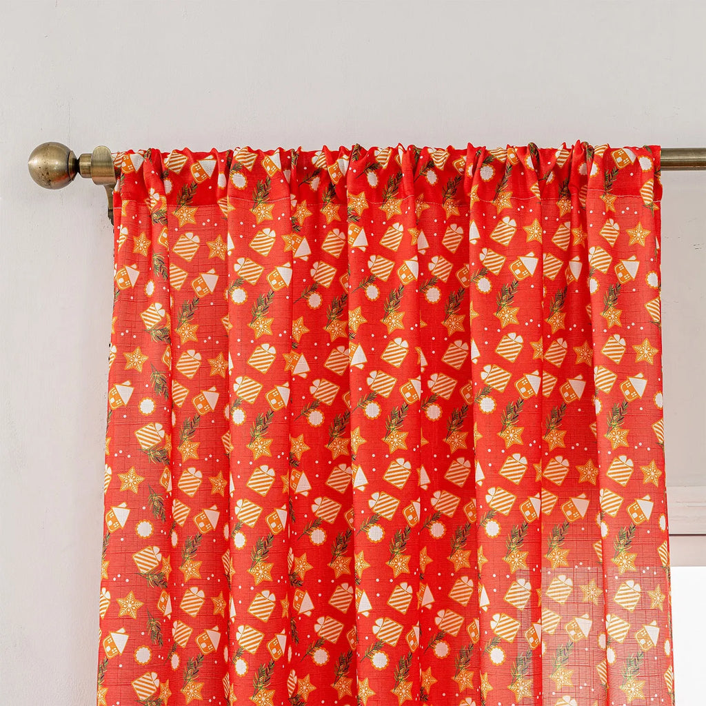 Red American-style cloth curtain with printed cartoon angels and snowmen, one metre wide.
