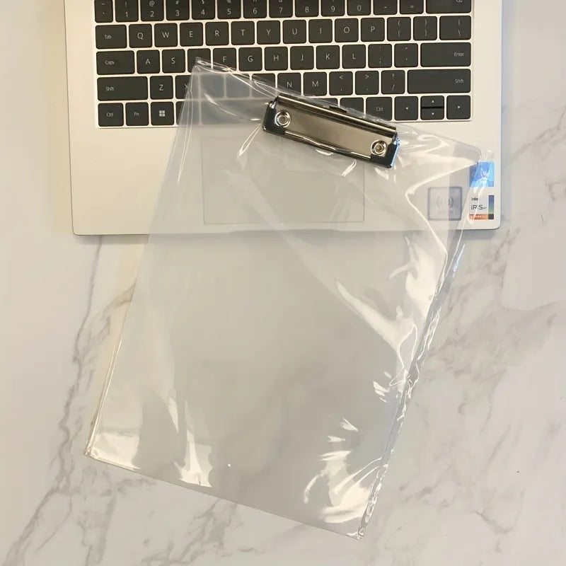 A4 transparent polypropylene clipboard with metal clip, shown in blue, holding paper.