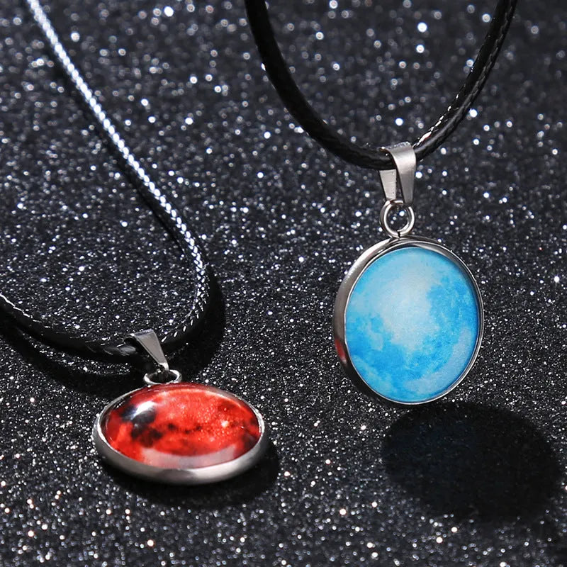 Luminous alloy pendant necklace with constellation design in coloured glass, showing extension chain